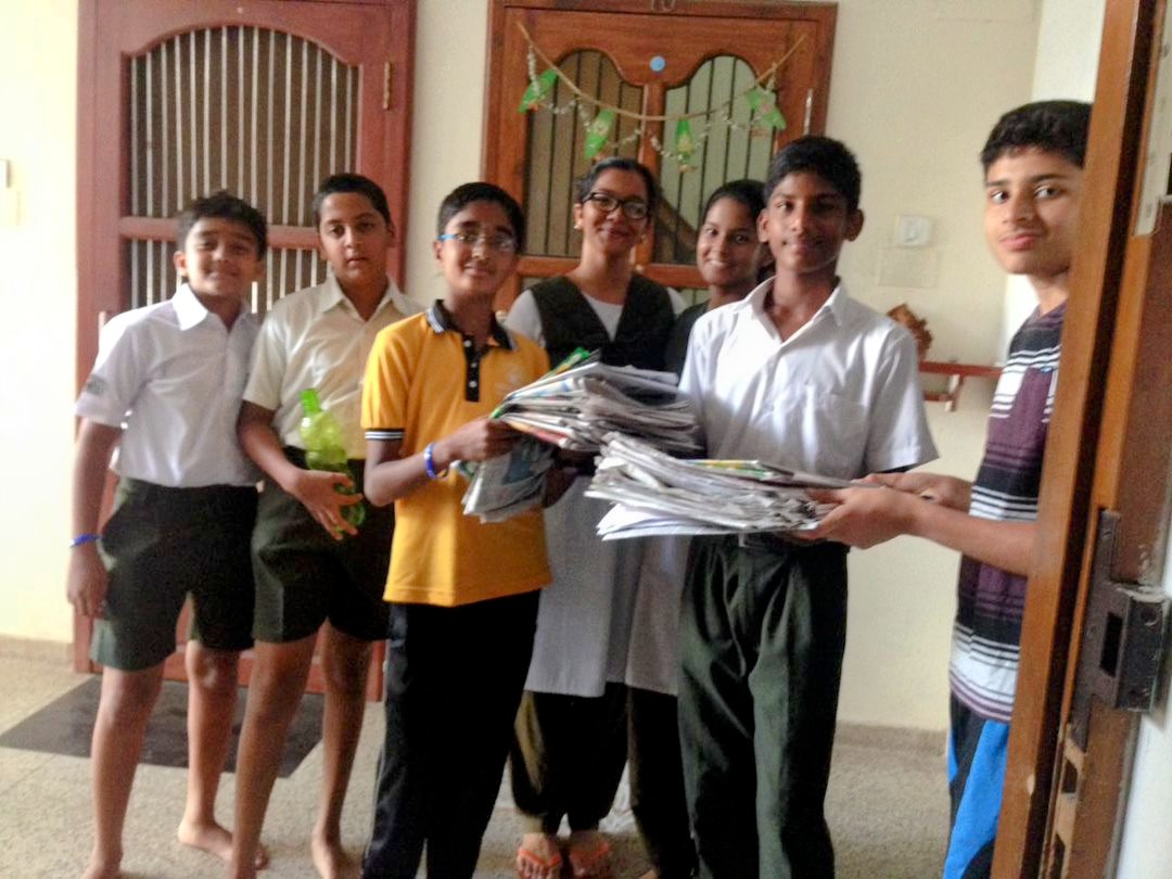 Manasvini with students group newspaper recycling